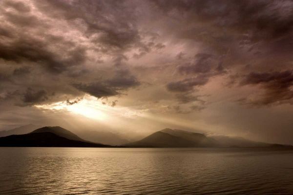 WA, Seabeck God rays shine through dark clouds